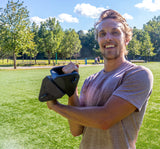 Person using self-resistance equipment outdoors