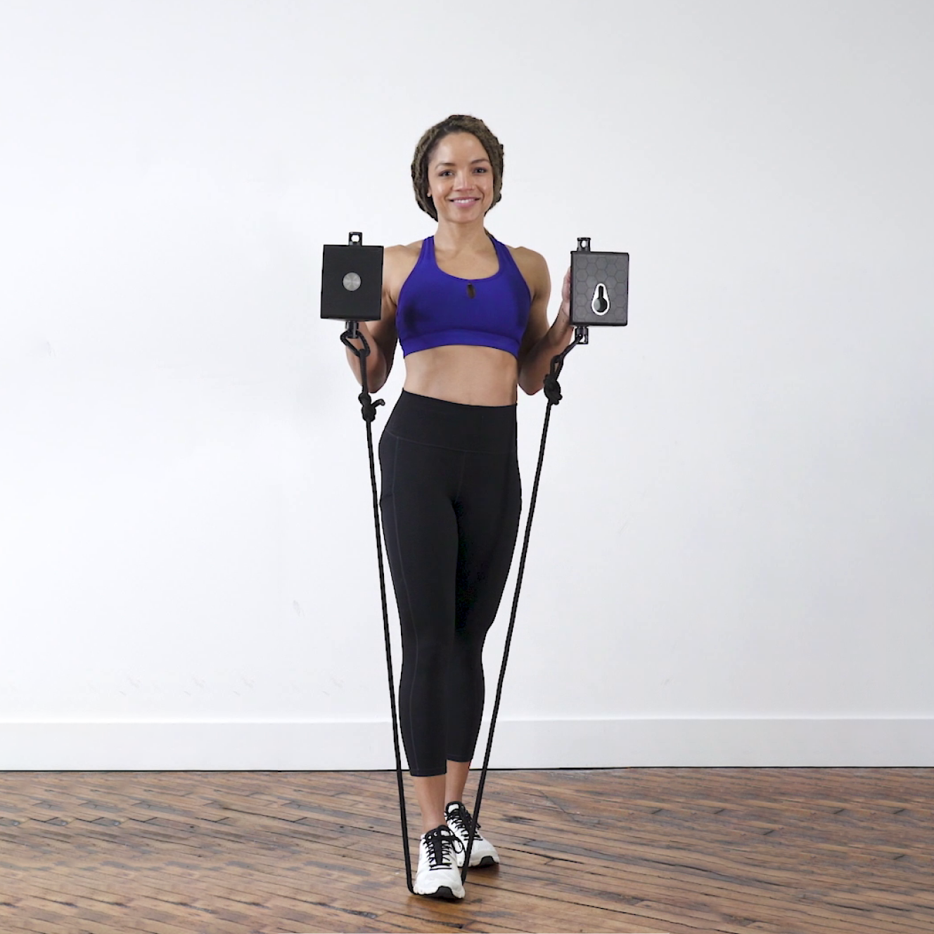 Woman holding Jump Rope Attached to the Olympus Grip